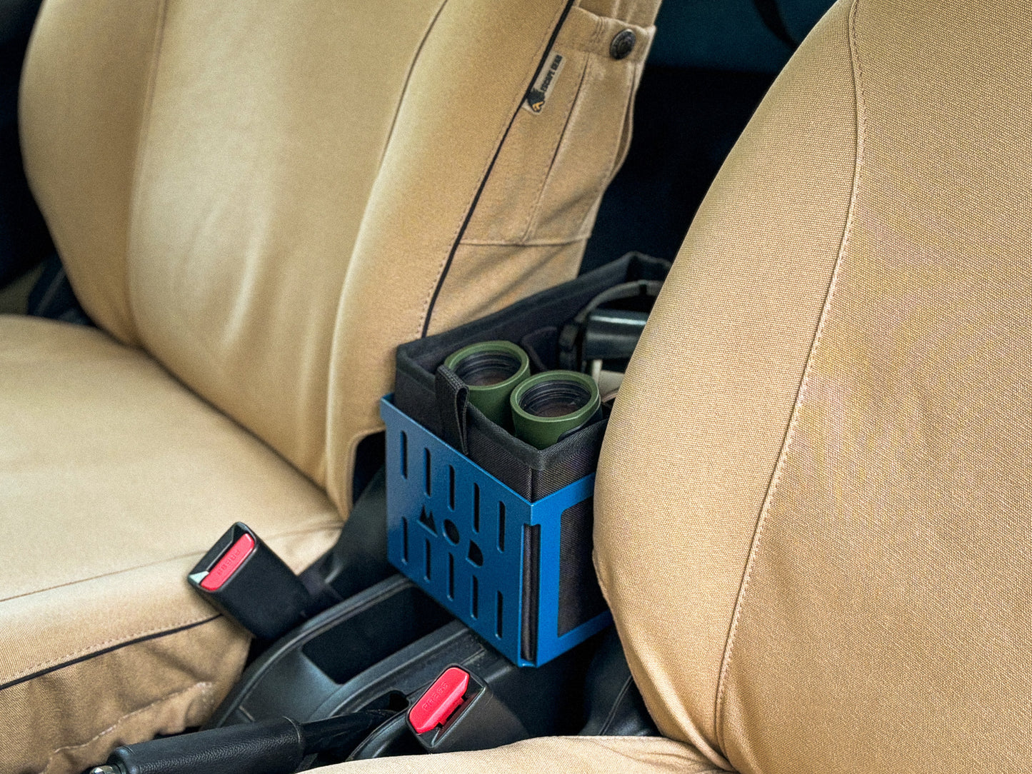 Caddy Box in Strong Blue with Black Caddy Pouch pack with binoculars between Jimny 4 seats