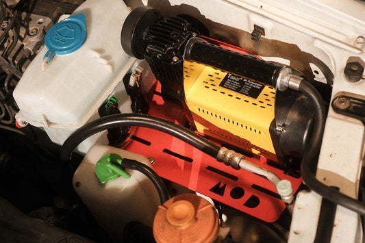 Engine Bay Mount in Red installed in Jimny 3 with air compressor