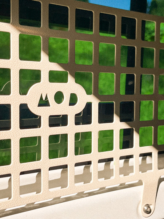 Molle panel detail with logo in the center.