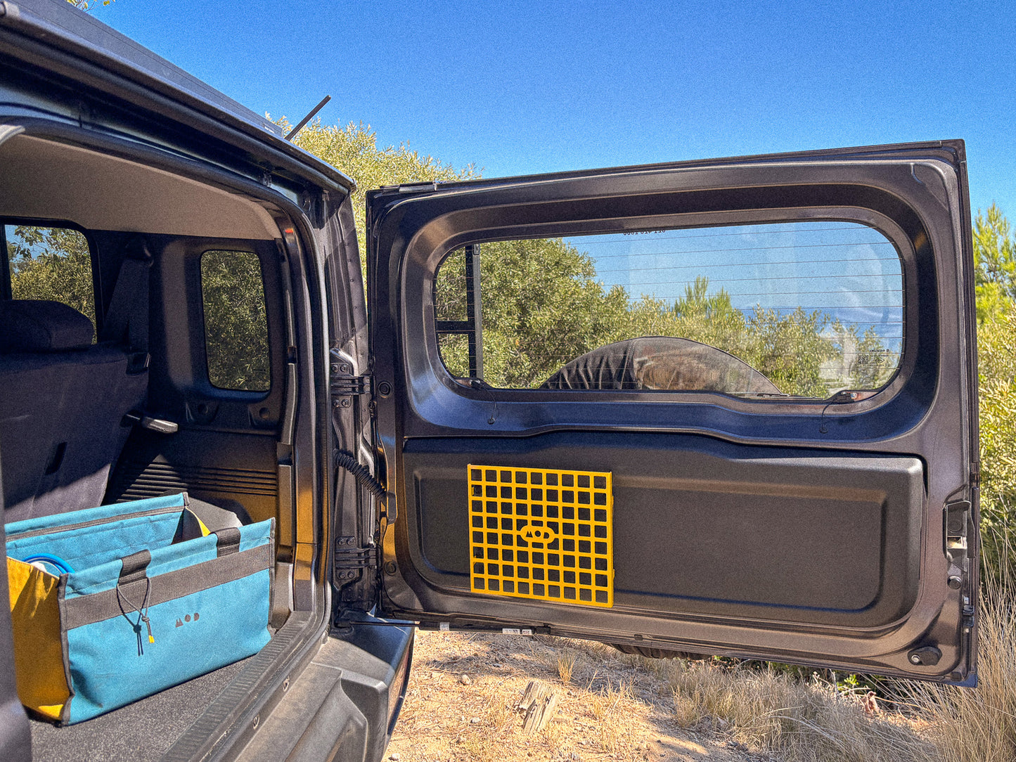 MOD Molly Molle panel installed on Jimny 4 rear door in yellow