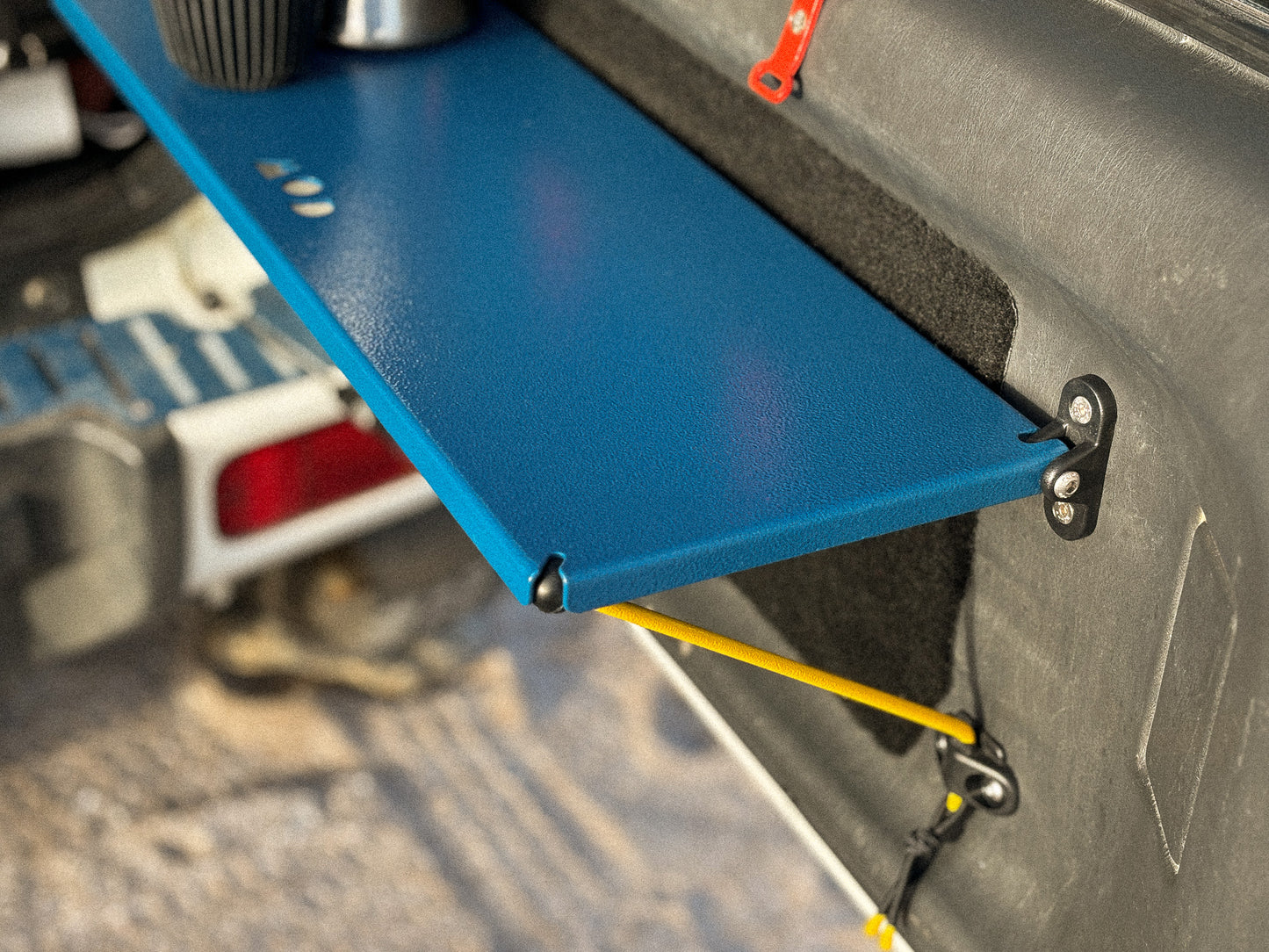 Rear Door Table in Blue in Jimny 3 arm detail
