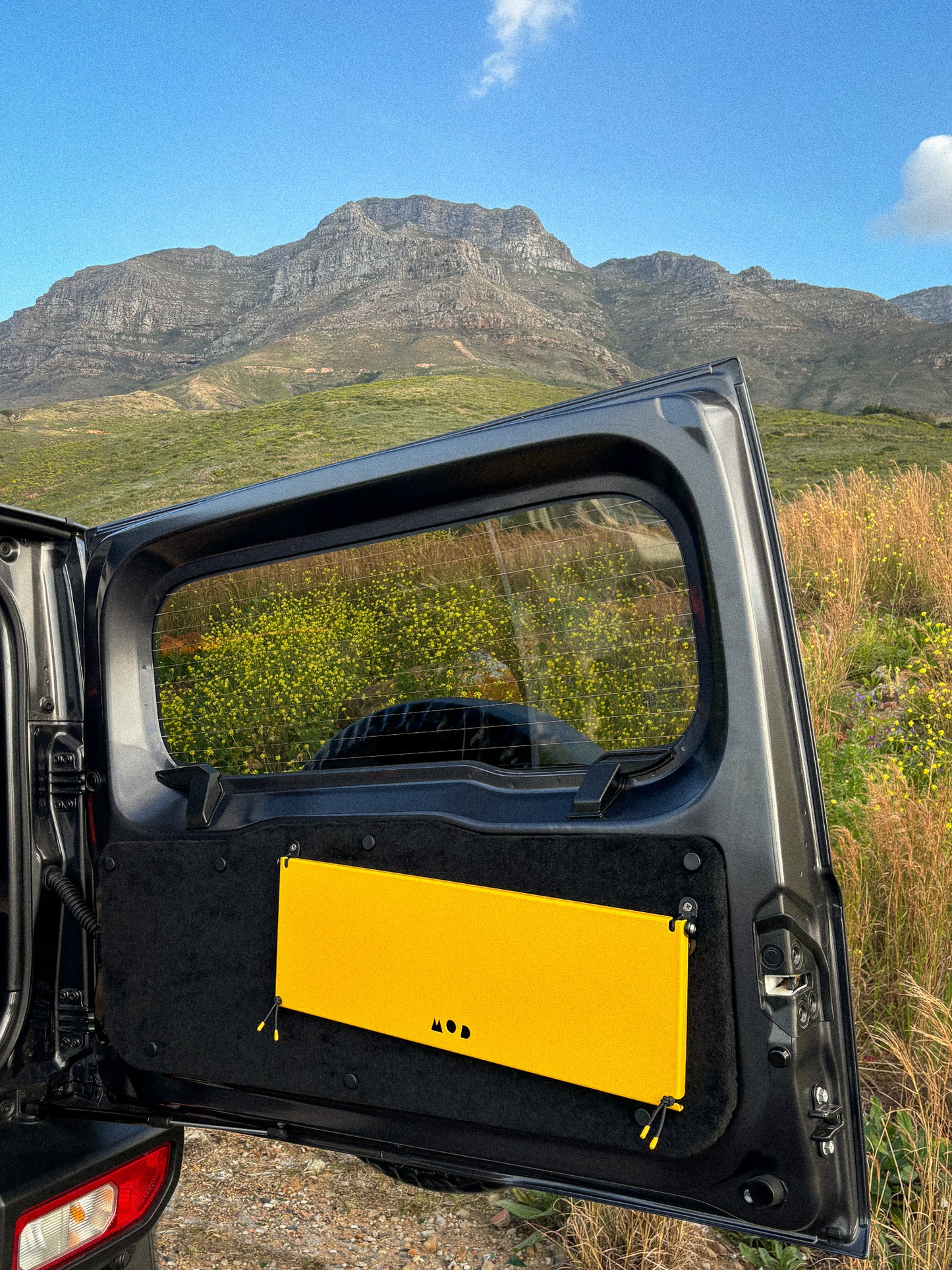 Rear Door Table in Yellow in a Jimny 4 and Utility Panel