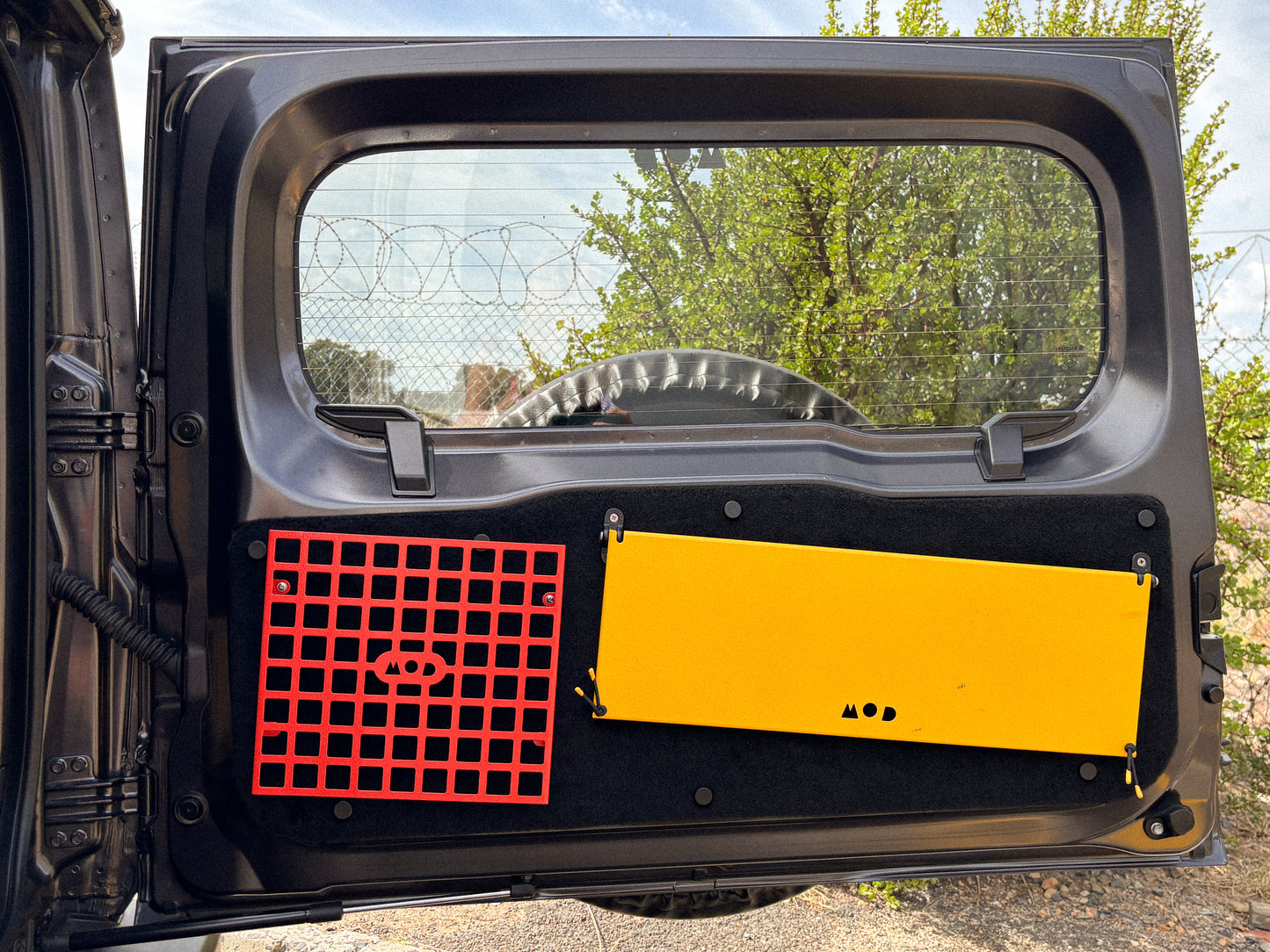 Rear Door Table and Molly (molle panel) installed in a Jimny 4
