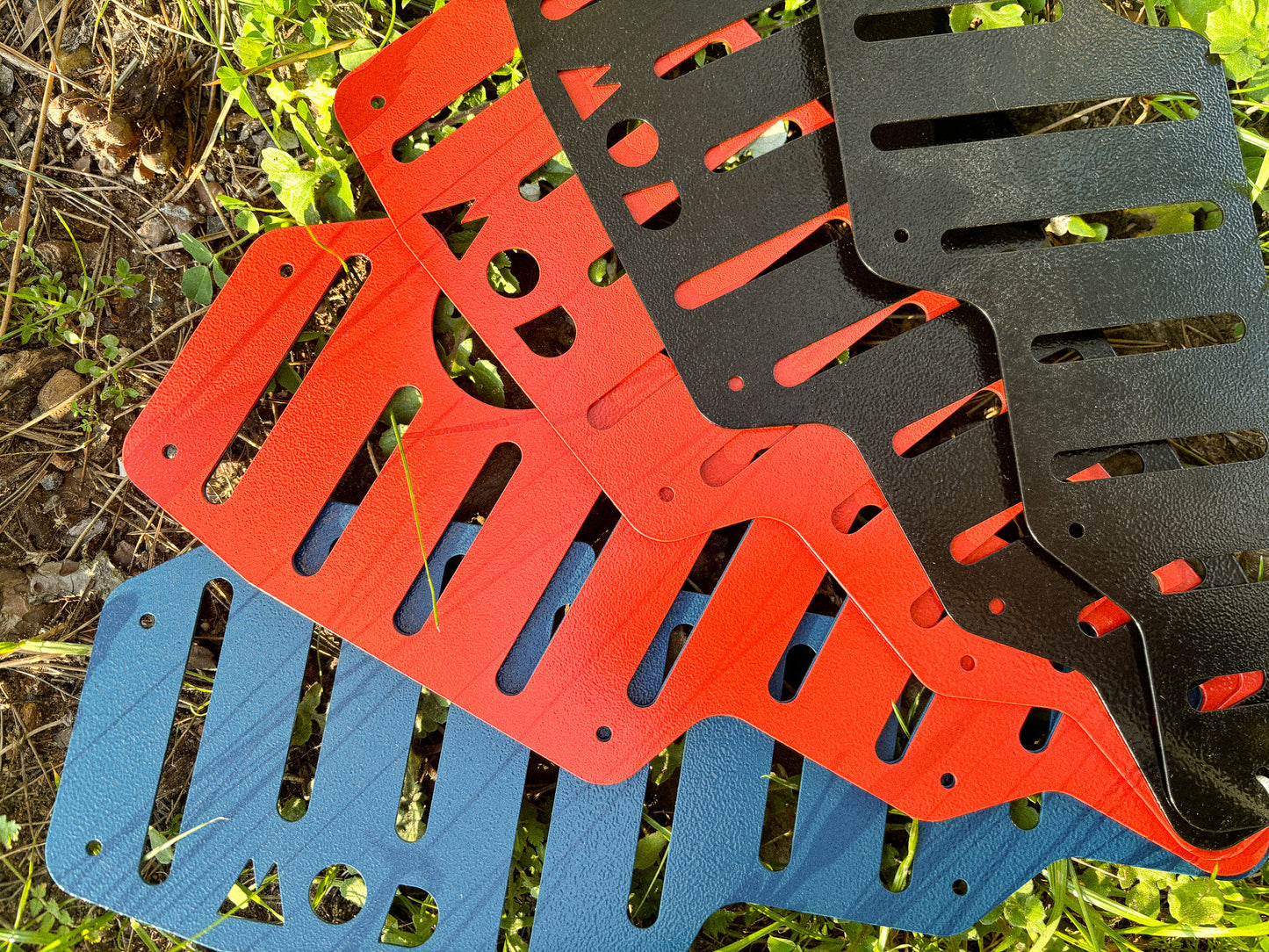 Tread Plates product shot showing all colours: Blue, Red, Black