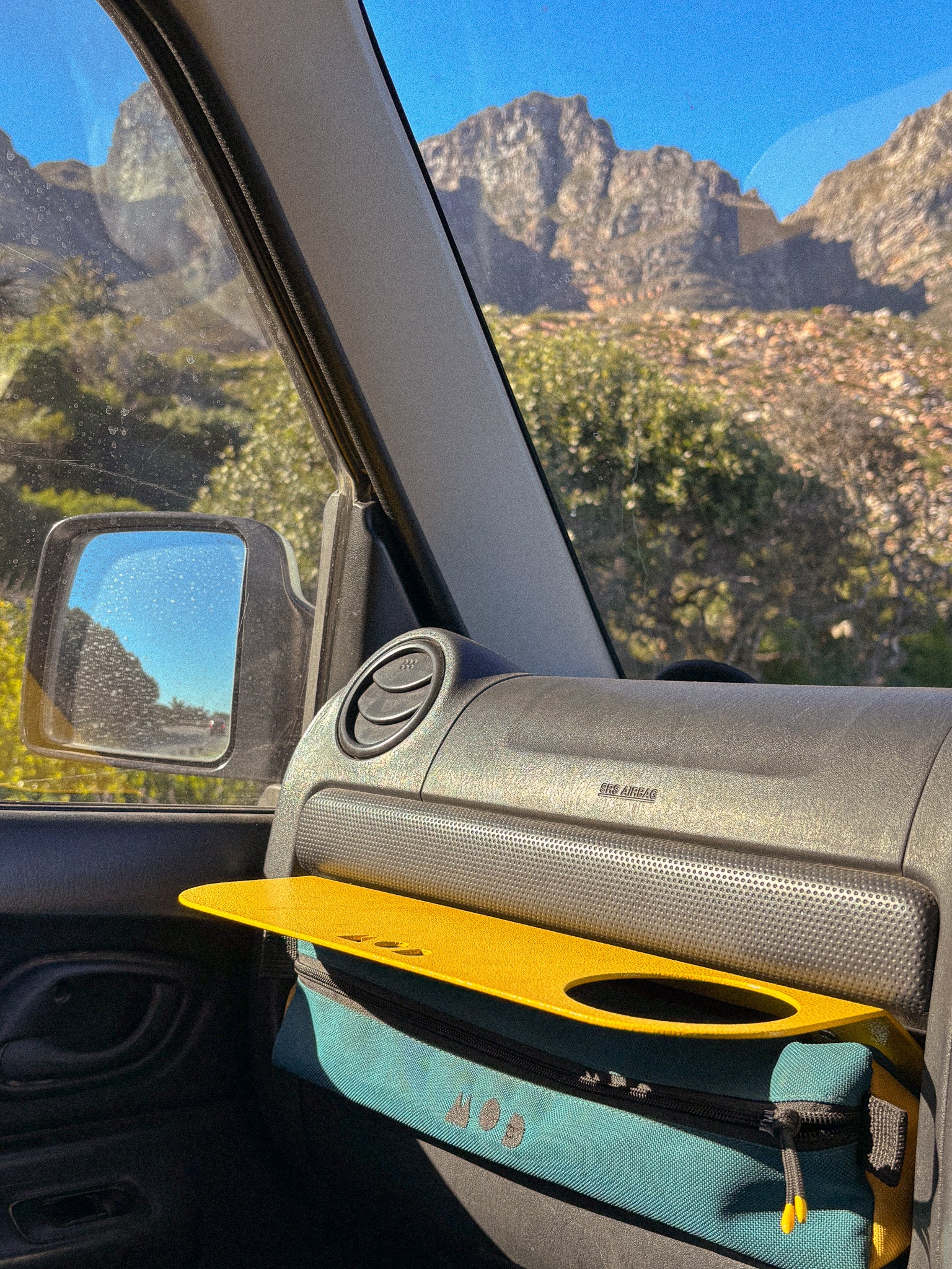 Dash Shelf installed in a Jimny 3 with Cup holder and Dash Pouch storage