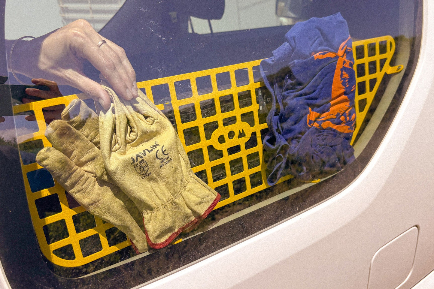 Suzuki Jimny 3 rear window molle panel packed and shown from the outside of the vehicle 