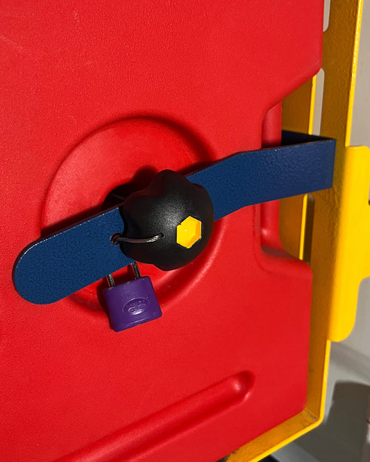 Red portable fuel tank on Fuel Tank holder show detail of lock