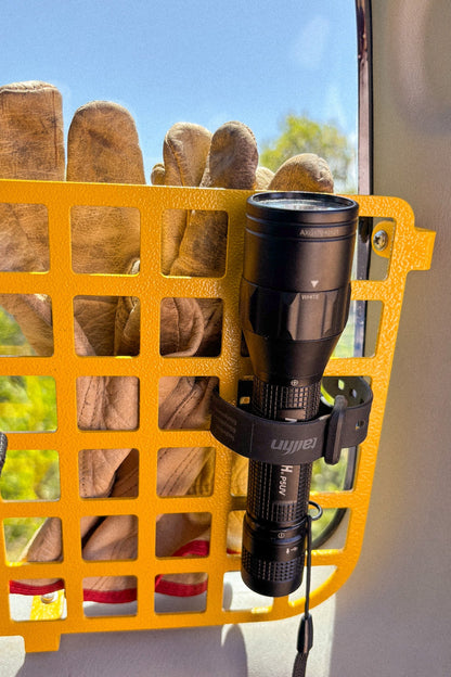 Suzuki Jimny 3 rear window molle panel installed with flashlight strapped on