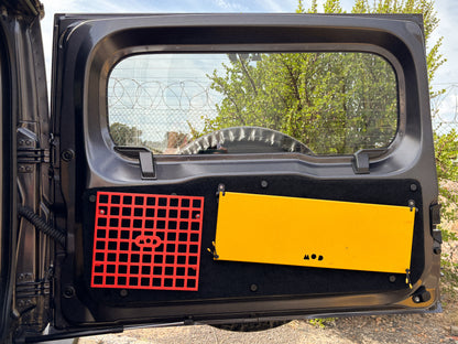 Rear Door Table and Molly (molle panel) installed in a Jimny 4