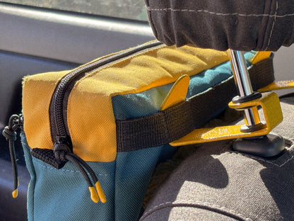 Yellow Seat Hooks on the headrest of a Suzuki Jimny 3