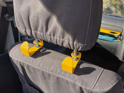 Seat Hooks on headrests to create extra storage