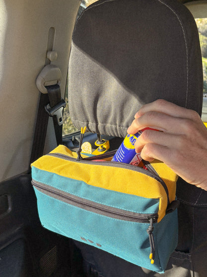 Seat Hooks on headrest posts in Suzuki Jimny showing extra storage solution